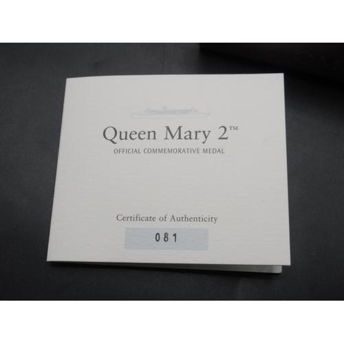 29A - Royal Mint - Queen Mary 2 Official Commemorative 22ct Gold Medal, No.081/100, encapsulated in origin... 