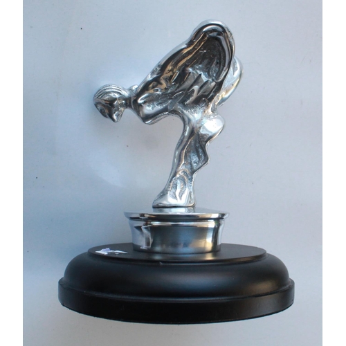 379 - Pair of Spirit of Ecstasy chrome book ends. Desk top Spirit of Ecstasy on wooden plinth.