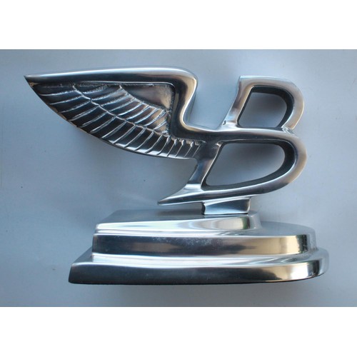 380 - Bentley chrome Flying B car mascot on chrome plinth.