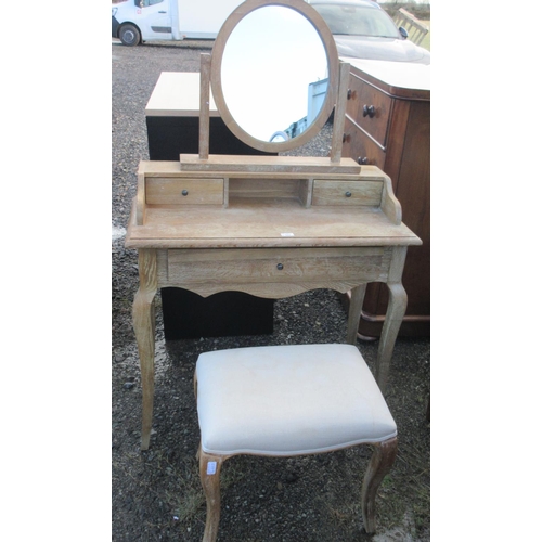 577 - Limed oak dressing table, with oval mirror and shaped frieze with drawer on cabriole legs, matching ... 