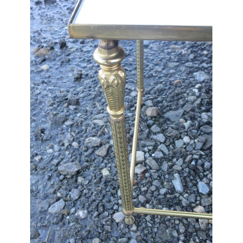 582 - Graduated pair of rectangular mirror topped coffee tables on gilt metal supports, W55cm D39cm H44cm ... 