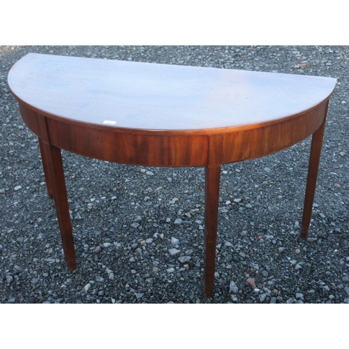 589 - 19th century mahogany demi-lune side table, on square tapered supports, W135cm D62cm H70cm