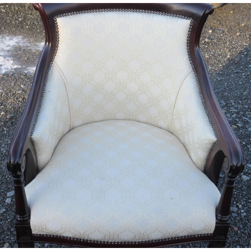 595 - Regency style mahogany framed upholstered curved back arm chair, on moulded supports, H95cm