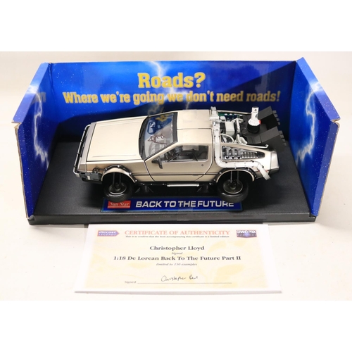 44 - Two boxed 1/18 scale well detailed diecast DeLorean car models from the motion picture Back To The F... 