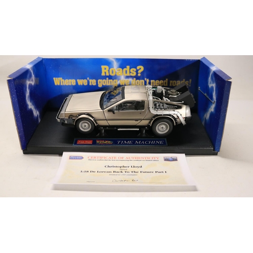 44 - Two boxed 1/18 scale well detailed diecast DeLorean car models from the motion picture Back To The F... 