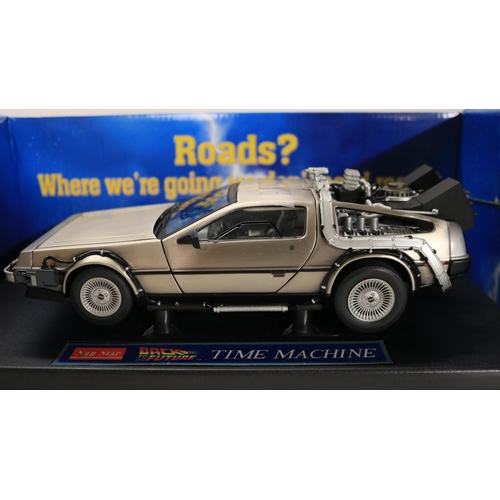 44 - Two boxed 1/18 scale well detailed diecast DeLorean car models from the motion picture Back To The F... 