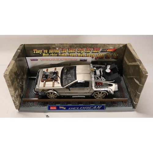 45 - Two boxed 1/18 scale well detailed diecast DeLorean car models from the motion picture Back To The F... 