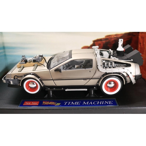 45 - Two boxed 1/18 scale well detailed diecast DeLorean car models from the motion picture Back To The F... 