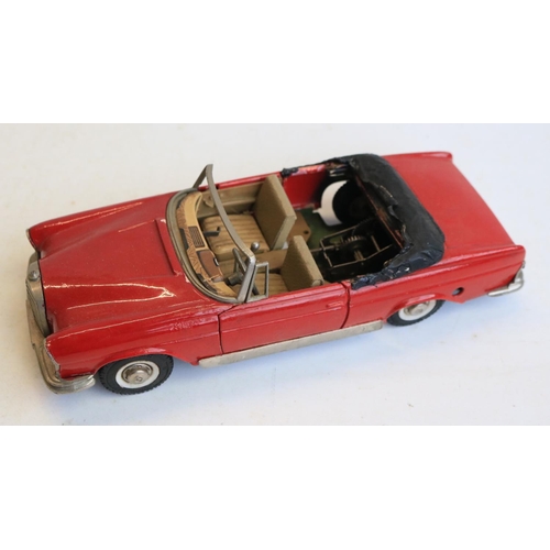 49 - Mixed collection of diecast vehicle models from Corgi and Matchbox, a vintage clockwork Mercedes 250... 