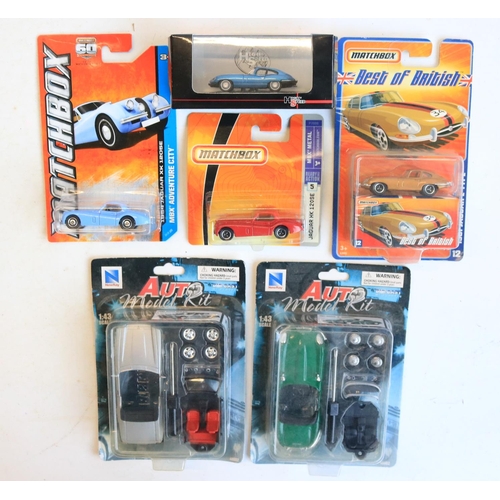 52 - Collection of boxed model cars, mostly diecast and mostly Jaguar themed (predominantly 1/43 scale) t... 