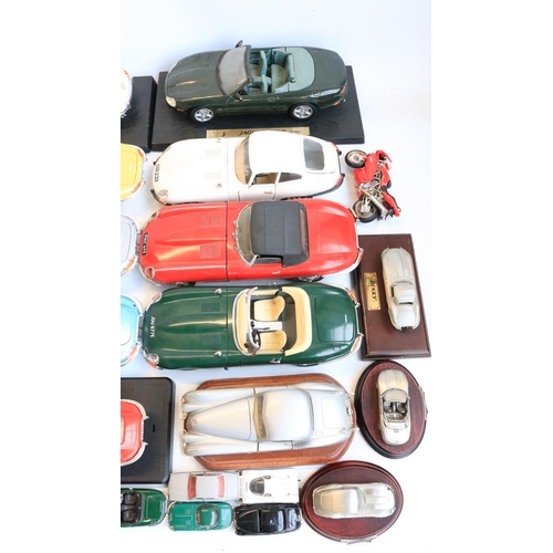 54 - Collection of unboxed/previously displayed model vehicles, mostly diecast and mostly Jaguar themed t... 