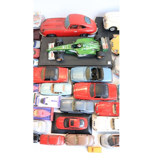 54 - Collection of unboxed/previously displayed model vehicles, mostly diecast and mostly Jaguar themed t... 