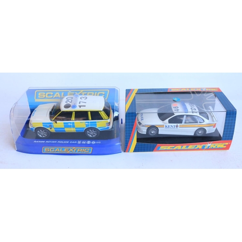 60 - Five 1/32 scale Scalextric slot car models to include C2484A limited edition Mini Cooper 'John Coope... 