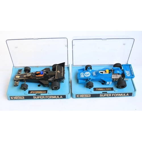 69 - Collection of boxed and unboxed 1/32 scale Scalextric slot cars to include boxed vintage Super Formu... 