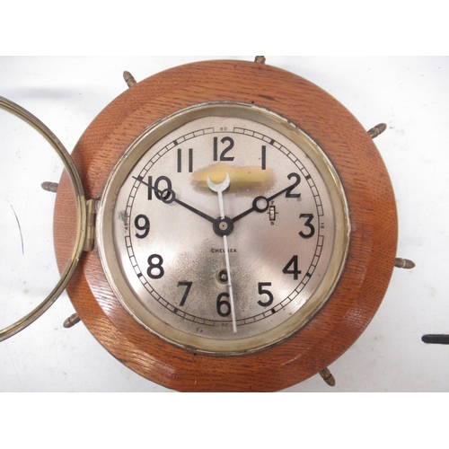 222 - Chelsea Clock Co., Boston for a retailer in Ottawa, 8 day bulkhead clock, oak case in the form of a ... 