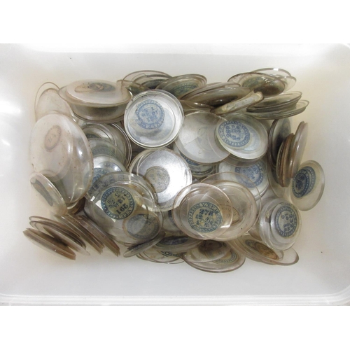 243 - Ten containers containing early 20th Century pocket watch and fob watch glasses