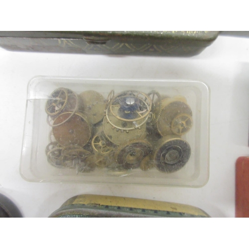 251 - Miscellaneous watch parts including pocket watch bows, watch mainsprings, winding crowns and stems e... 