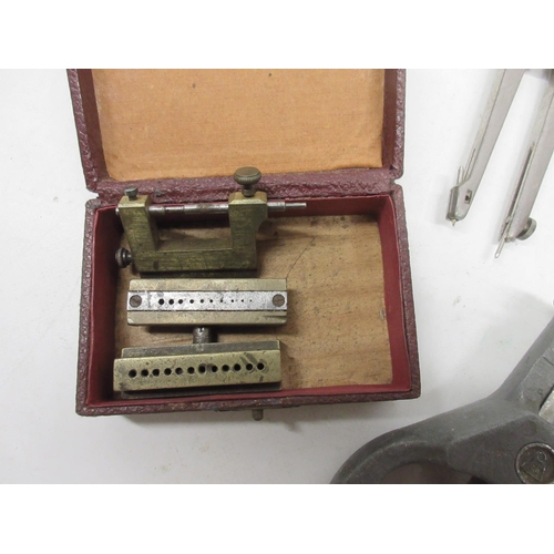 253 - Watchmakers repair tools including pliers, tweezers, needle files, movement holder etc.