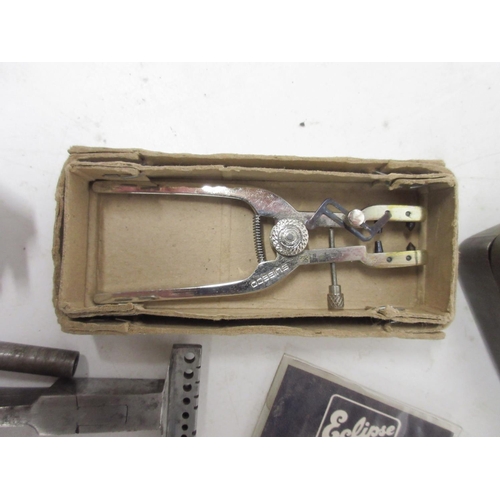 253 - Watchmakers repair tools including pliers, tweezers, needle files, movement holder etc.