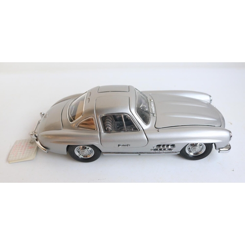 91 - Collection of diecast model cars to include a Franklin Mint 1/24 scale 1954 Mercedes-Benz 300SL 'Gul... 