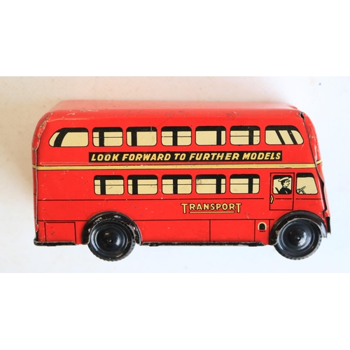 74 - Interesting collection of small vintage tinplate toys to include a Brimtoy Pocketoy clockwork bus (m... 