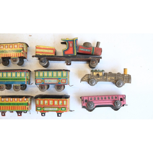 74 - Interesting collection of small vintage tinplate toys to include a Brimtoy Pocketoy clockwork bus (m... 