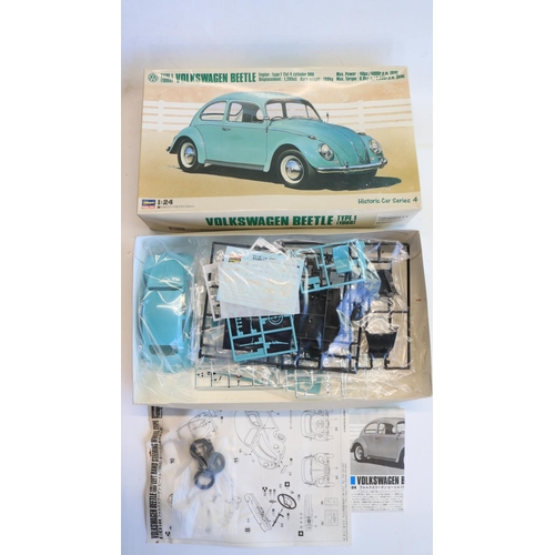 83 - Collection of mostly Volkswagen themed models to include 4 1/87 scale diecast car/caravan sets from ... 