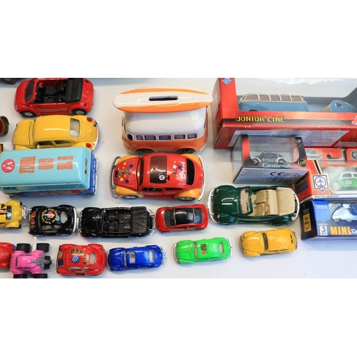 83 - Collection of mostly Volkswagen themed models to include 4 1/87 scale diecast car/caravan sets from ... 