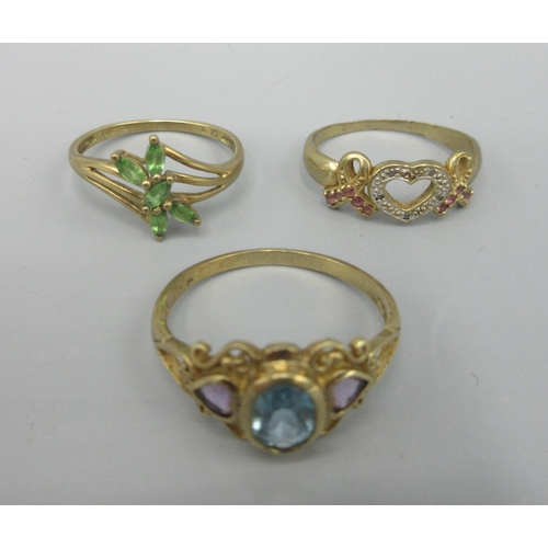 12 - 9ct yellow gold amethyst and blue topaz ring, size S, another 9ct gold ring set with green stones, s... 