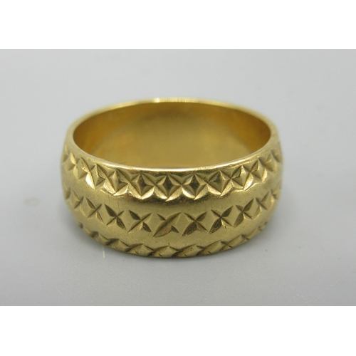 15 - 18ct yellow gold ring with engraved x pattern, stamped 18, size L1/2, 7.0g