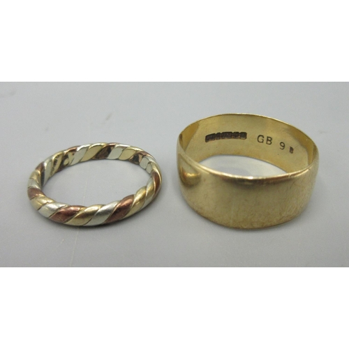 18 - 9ct yellow gold band ring, size R1/2, a 9ct multi tone band ring, L1/2, both stamped 375, 6.8g