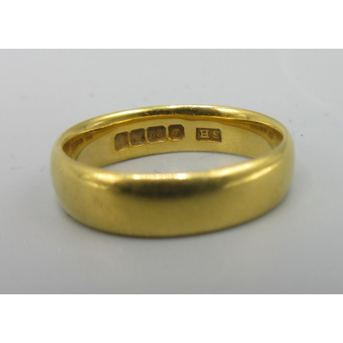 27 - 22ct yellow gold wedding band, stamped 22, size J1/2, 4.5g