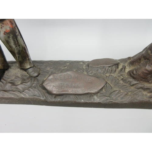 280 - Cast metal money box in the form of a man with a rifle shooting a tree, stamped  'Creed Moor Bank', ... 