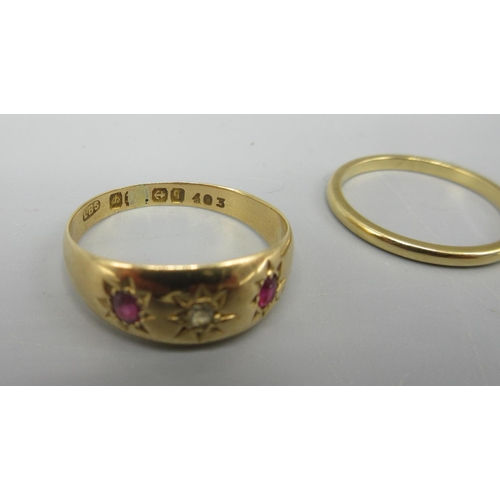 31 - 18ct yellow gold thin band ring, size J, and a yellow metal gypsy ring set with diamond and rubies, ... 