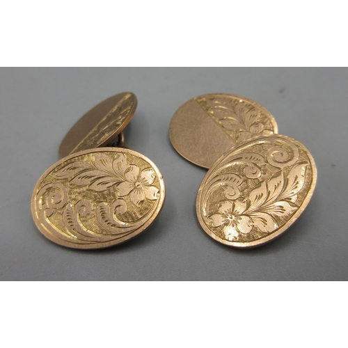 34 - 9ct rose gold cufflinks with engine turned floral detail, stamped 375, 8.2g