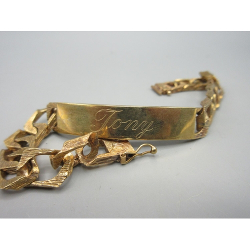 47 - 9ct yellow gold identity bracelet engraved 'Tony', the bracelet with textured detail, stamped 375, 3... 