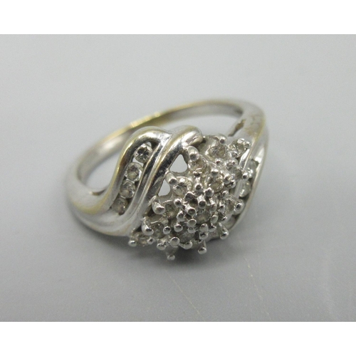 53 - 9ct gold cluster ring with diamonds set in floral design, stamped 375, size L, 3.27g