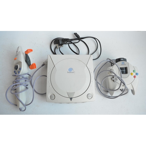 337 - Sega Dreamcast games console with one standard controller and a Fission Fishing Controller from Inte... 