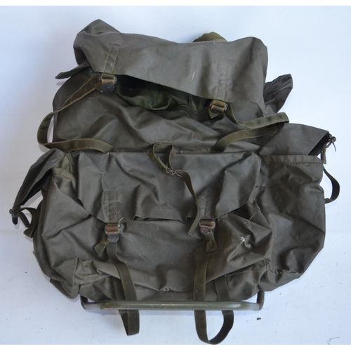 342 - Military bivouac, webbing (with some pouch contents, see photos) and a metal framed pack pack