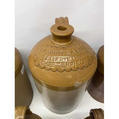 402 - Collection of stoneware flagons, predominantly Chesterfield breweries, max. H42cm (8)