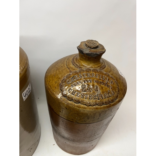 402 - Collection of stoneware flagons, predominantly Chesterfield breweries, max. H42cm (8)