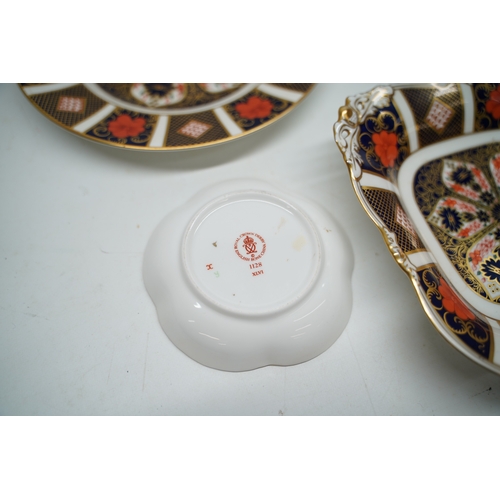 319 - A collection of Royal Crown Derby Old Imari 1128 pattern ceramics incl. A pin dish, W11cm; footed di... 