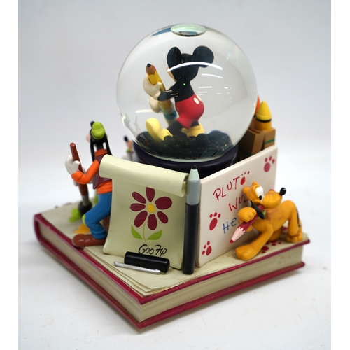 329 - Disney 'Sketches' musical snow globe, H23cm