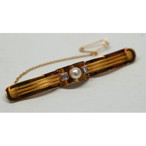 470 - 14ct yellow gold bar brooch set with central pearl flanked by diamonds in square setting, stamped 58... 