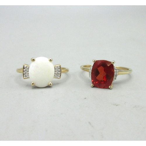 486 - 10ct yellow gold ring set with red stone and diamonds, size R1/2, and a 9ct yellow gold ring set wit... 