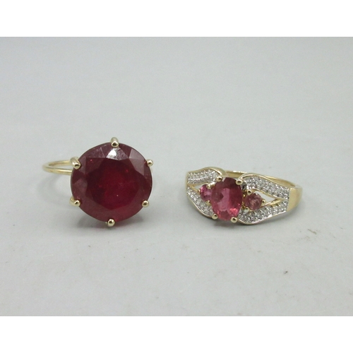 488 - 10ct yellow gold ring set with large red stone, size S, and another 10ct yellow gold ring set with a... 