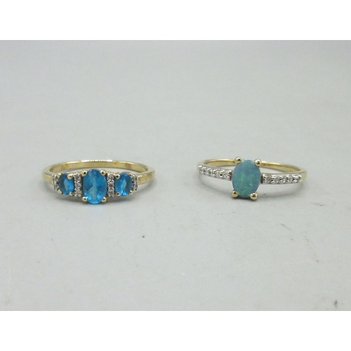 489 - 10ct yellow gold blue stone and diamond ring, size S, and a 10ct yellow gold ring set with opal and ... 