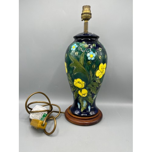 276 - A Moorcroft table lamp in the 'Buttercup' pattern, H35cm