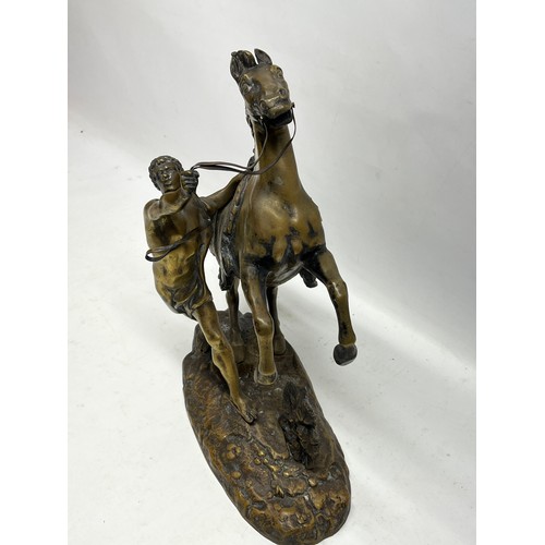 194 - After Guilaume Couston patinated brass Marley Horse, H37cm