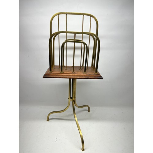 630 - Art Deco brass and oak swivel two division magazine rack on three outsplayed legs, stamped Rd, W39cm... 